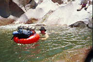 Me swiming in Workman creek with my backpack.