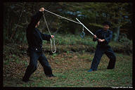 Ebi-chan cathes Niwa-san's katana with the rope.