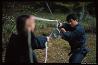 Ebi-chan controls Niwa-san's katana with the rope.