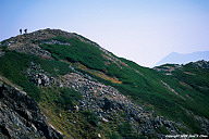 Two hikers on the trail to Shirouma Oike.