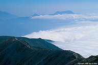 Togakushi-yama sticking up throught the clouds covering Nagano.